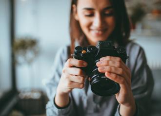 woman holding camera